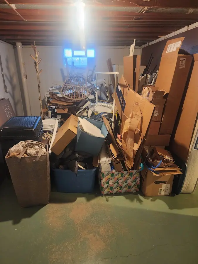 Roll-off dumpster container at job site for 2 Yard Dumpster Rental in Sault Ste. Marie